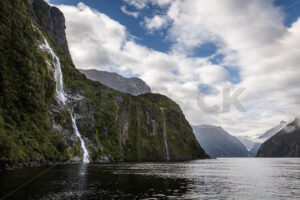 A High Waterfall at Milford Sound, Fiordland, New Zealand - SCP Stock