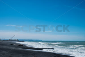 A blue sky winter day looking towards Napier Port and Waipatiki in the distance, Napier, Hawke’s Bay, New Zealand - SCP Stock