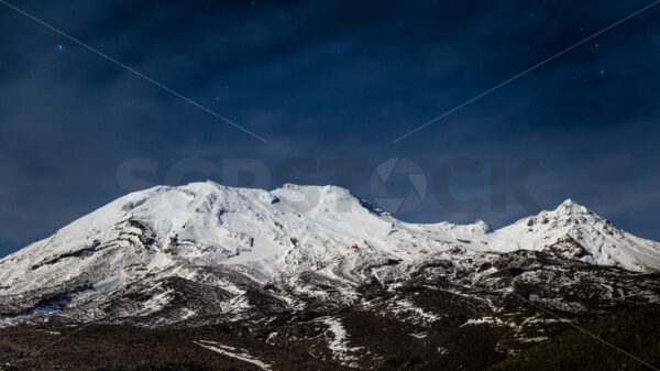 A moon-lit evening at the Turoa ski area, Mount Ruapehu, North Island, New Zealand - SCP Stock