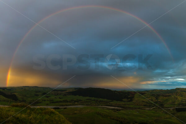 A rainbow over the Tukituki valley, Hawke’s Bay, New Zealand - SCP Stock