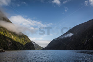 Blue Sky Morning at Milford Sound, Fiordland, New Zealand - SCP Stock