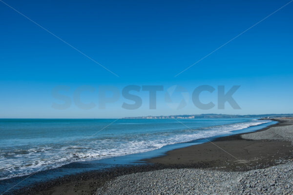 Blue skies at Haumoana Beach, Hawke’s Bay, New Zealand - SCP Stock