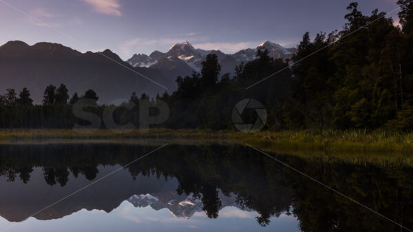 Dawn at Lake Matheson, Fox Glacier, South Westland - SCP Stock