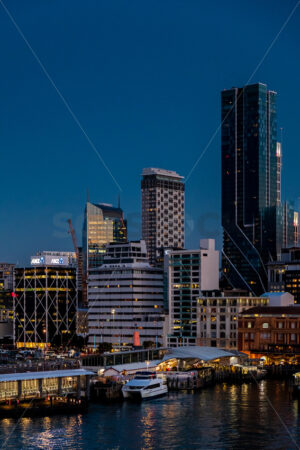 Downtown Ferry Terminal & Auckland CBD at twilight - SCP Stock