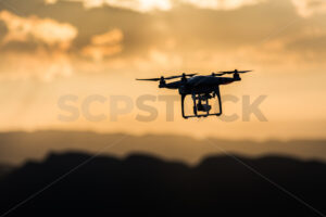 Drone in Flight at sunset - SCP Stock