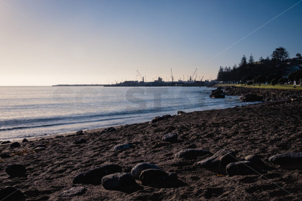 Early morning at the Perfume Point Reserve beach, Ahuriri, Napier, Hawke’s Bay, New Zealand - SCP Stock