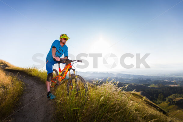 Mountain Biking at golden hour on Te Mata Peak, Hawkes Bay, New Zealand - SCP Stock