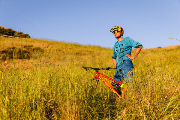 Mountain Biking at golden hour on Te Mata Peak, Hawkes Bay, New Zealand - SCP Stock