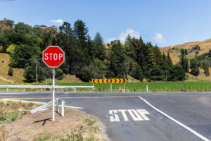 Road intersection and stop sign, Eskdale, Hastings District, Hawke’s Bay, New Zealand - SCP Stock