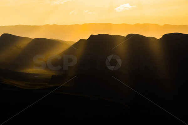 Sun rays on the Hawke’s Bay landscape, New Zealand - SCP Stock