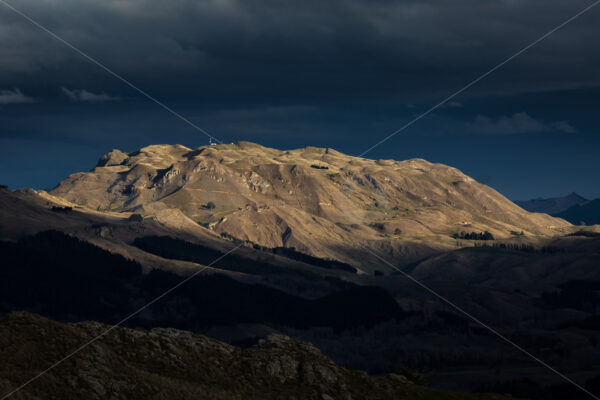 Sunlight on the sacred mountain, Mount Kahuranaki, Hawke’s Bay, New Zealand - SCP Stock