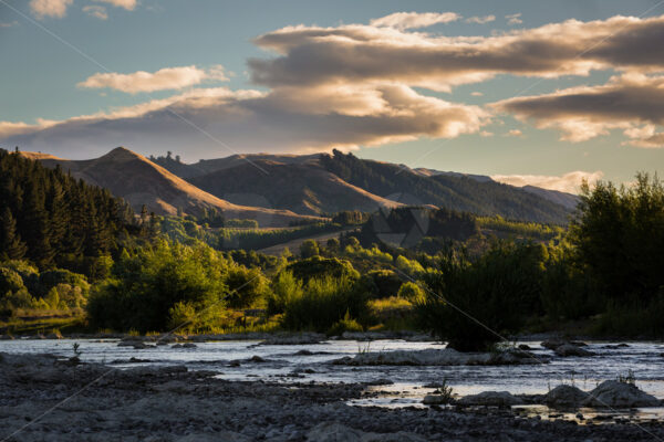 The Tukituki River in the late aftenoon light, Hawke’s Bay, New Zealand - SCP Stock