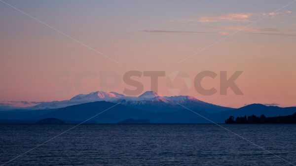 Mount’s Ngauruhoe & Ruapehu as seen from Taupo, Waikato, New Zealand - SCP Stock