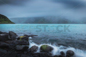 A yacht at Anchor, Akoroa, Banks Peninsula, Canterbury, New Zealand - SCP Stock