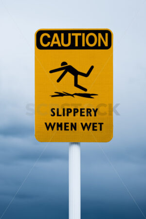 CAUTION, Slippery When Wet signage, Ahuriri, Napier, Hawke’s Bay, New Zealand - SCP Stock