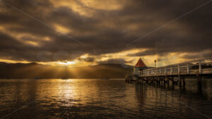 Daly’s Wharf historic jetty, Akaroa Harbour, Banks Peninsula, Canterbury, New Zealand - SCP Stock