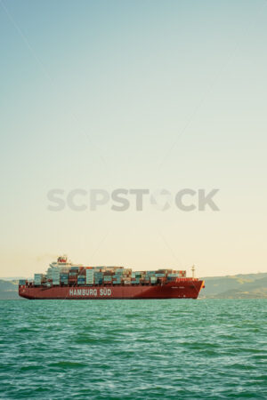 Monte Rosa, Hamburg Sud/Maersk Line container ship departing Napier Port, Hawke’s Bay, New Zealand - SCP Stock