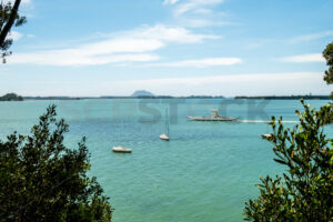 Matakana Island car ferry departing Omokoroa - SCP Stock